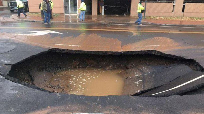 A giant sinkhole opened in New Britain, Connecticut, after a water main broke.
