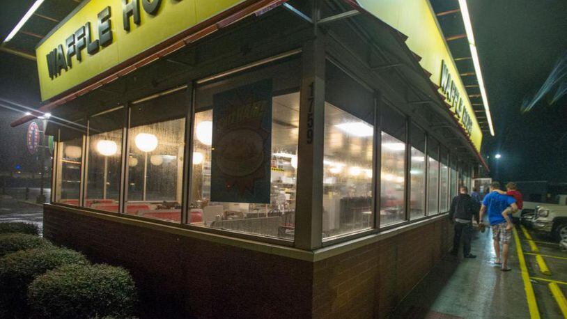 The family of a man killed at a Waffle House in Tennessee is suing the father of the accused shooter.