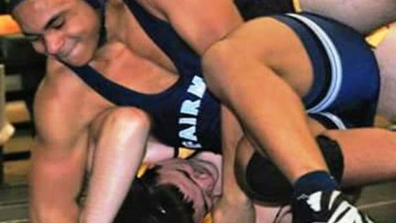 Ahmed Doucet is shown wrestling in a file photo. Doucet, a standout for the Kettering Fairmont team, suffered a serious stroke while at wrestling practice in 2015.