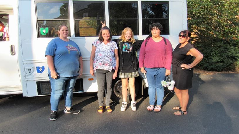 Class facilitator Meredith Carter, right, and members of a new parenting class at Oesterlen Services for Youth have spent several weeks learning new communications skills and tools. A new class will start in September. CONTRIBUTED