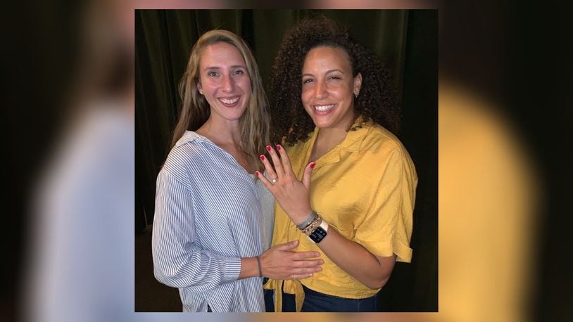 Casey Nance shows off her engagement ring. She and Cassie Sant, former Dayton Flyers teammates, plan to wed next May 21. CONTRIBUTED