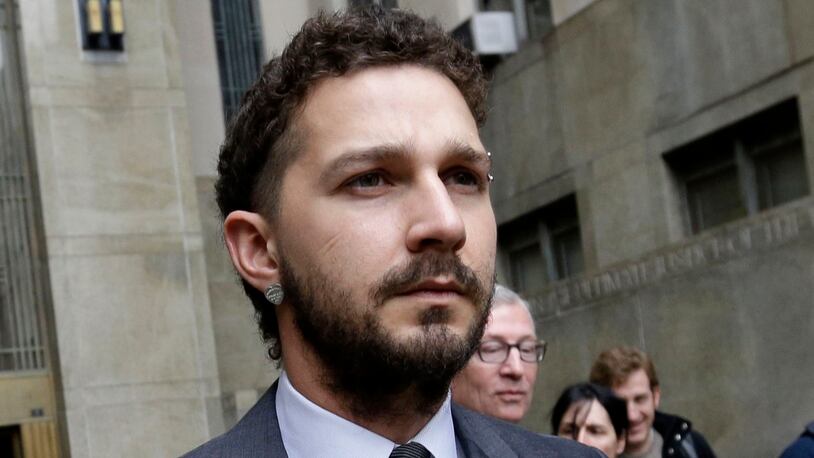 FILE - In this March 20, 2015 file photo, actor Shia LaBeouf is escorted by court officers as he leaves Manhattan Criminal court in New York. LaBeouf has received stitches to his head and hand after suffering an injury on the North Dakota set of the film American Honey. A publicist for LaBeouf said on Wednesday, June 24, the actors injuries were minimal. The accident occurred Tuesday evening for a scene in which the actor was to put his head through a glass window. LaBeouf was treated at a local hospital for a laceration to his head and hand. Hes to return to shooting Thursday. (AP Photo/Mary Altaffer, File )