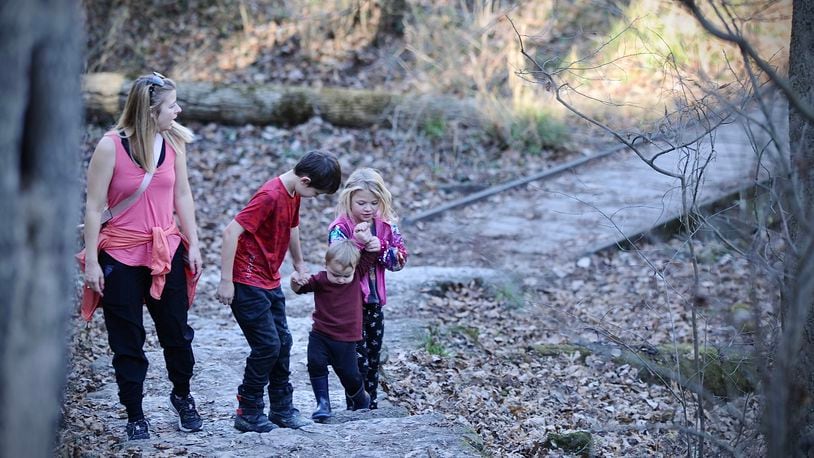 Larissa Smith and her children Maxwell, age 9, Samuel, age 1, and Alayna, age 6, traveled from Columbus to visit Glen Helen, Thursday, November 16, 2023. MARSHALL GORBY \STAFF