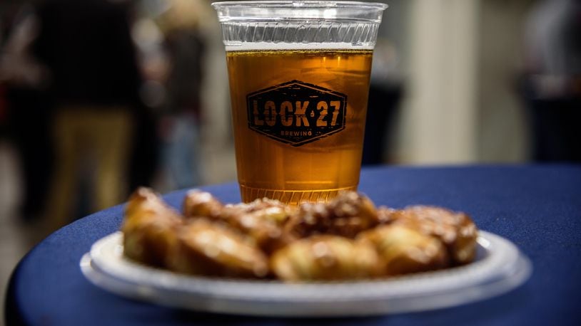 Another brewery in the robust Dayton-area craft-brewing scene has added a milestone to its development.  Lock 27 Brewing, which operates locations in downtown Dayton and Centerville, hosted a party on Friday, Jan. 25 at its downtown brewery to celebrate the first ever release of its popular Mouth Breather IPA and Lock Tender Golden Ale in cans. TOM GILLIAM / CONTRIBUTING PHOTOGRAPHER