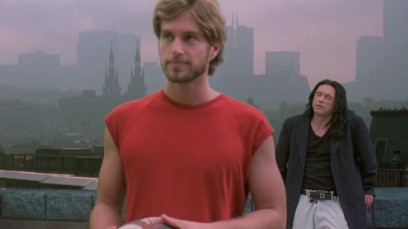 A scene from "The Room" with Greg Sestero (foreground) and Tommy Wiseau (background). CONTRIBUTED