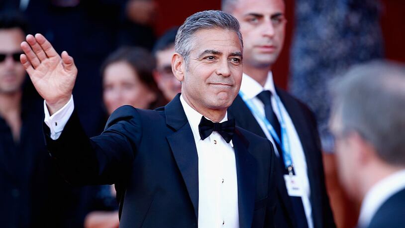 VENICE, ITALY - AUGUST 28:  Actor George Clooney attends the Opening Ceremony And 'Gravity' Premiere during the 70th Venice International Film Festival at the Palazzo del Cinema on August 28, 2013 in Venice, Italy.  (Photo by Andreas Rentz/Getty Images)
