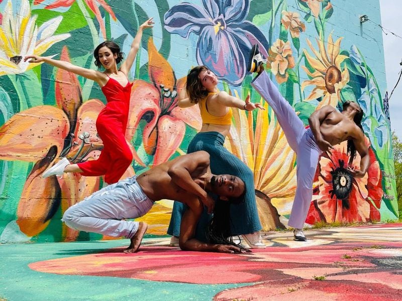 (left to right) Dayton Dance Initiative company members Miranda Dafoe, Devin Baker, Emilia Dagradi, and Quentin Sledge.  (Mural by Tiffany Clark).