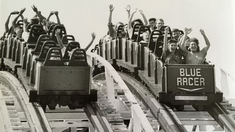 The twin-track Racer at Kings Island was the word's first full-length wooden roller coaster to travel in the backward direction. The ride opened in 1972, with both trains running in the forward direction. One train was turned around in 1982. CONTRIBUTED/JOURNAL-NEWS PHOTO ARCHIVES