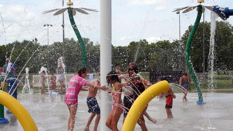 The sprayground at Activity Center Park off North Main Street in Centerville allows children of all ages to have fun getting wet in hot weather. The popular attraction is set to get a $475,000 upgrade in 2024, with Dayton Children's Hospital donating $150,000 toward the renovations. STAFF FILE PHOTO