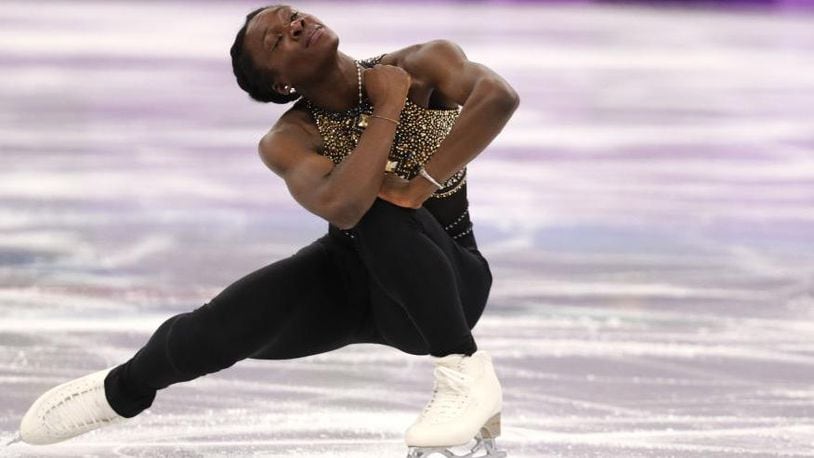 Mae Berenice Meite of France glides across the ice during her Sunday program at the Winter Olympics.