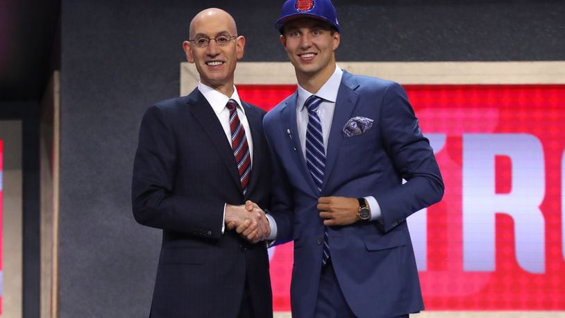 Luke Kennard, seen here with NBA commissioner Adam Silver after being drafted 12th overall by the Pistons, hit a big 3-pointer to force overtime, but Detroit lost in the championship game of the Orlando Summer League.