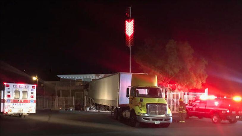 A semi-truck crashed through the front gates and the front door of the Moonlite BunnyRanch, the famed Nevada brothel featured in the "CatHouse" reality television show near Carson, Nevada.