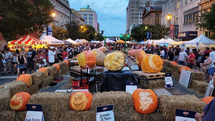 High Street was closed down and lined with vendors, food trucks, rides, games, pumpkins and more for visitors to enjoy Saturday, Oct. 9, 2021 at Operation Pumpkin in downtown Hamilton. NICK GRAHAM / FILE
