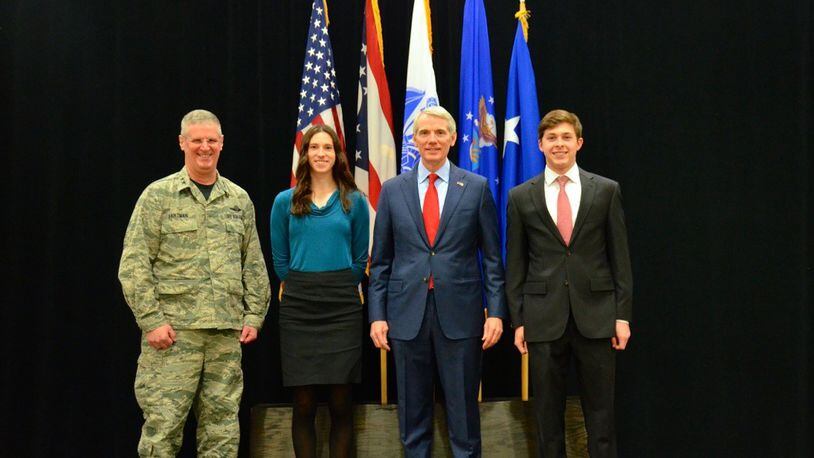 Local students were honored in January for their nominations to U.S. service academies. From left are Major General Mark Bartman, Abigail Arestides, U.S. Sen. Rob Portman and Nicholas Groene. Not pictured are student nominees Charles Lyon and Tyler Long. CONTRIBUTED PHOTO