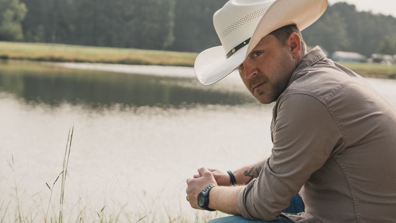 Chart-topping country artist Justin Moore, headlining the K99.1-FM Birthday Bash at Fraze Pavilion in Kettering on Friday, July 15, started a new side hustle in late 2021 as sports talk radio host on “Morning Mayhem” on 103.7 The Buzz.