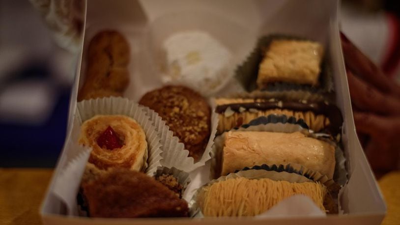 A pastry variety box is among the items for sale in the Greek Holiday Market. Pictured are pastries from a previous Greek Festival.  TOM GILLIAM / CONTRIBUTING PHOTOGRAPHER