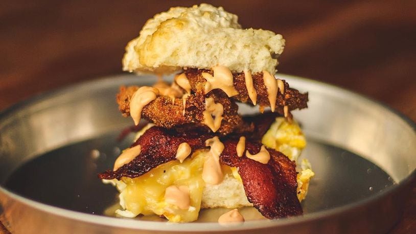 One of Lock 27's brunch items is a house made biscuit, fried green tomatoes, eggs, cheese, bacon and chipotle aioli. Source: Facebook