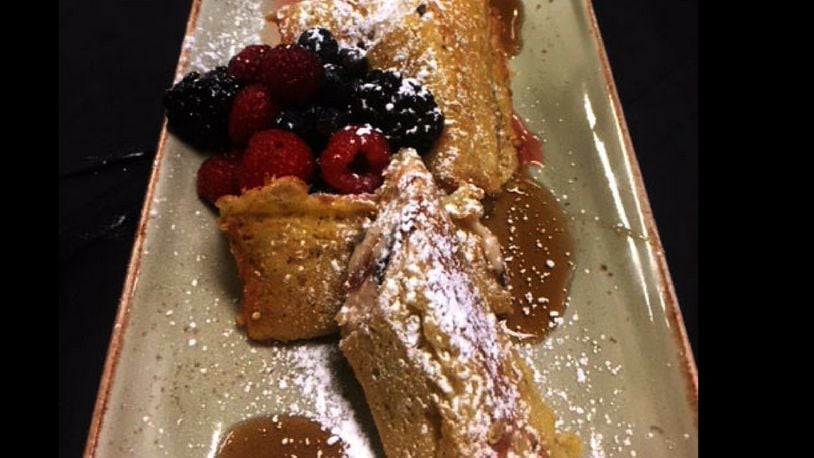 Dewberry 1850 Restaurant and Lounge's cannoli French toast includes maple syrup and macerated berries. The dish will be on the restaurant's upcoming weekend brunch menu.