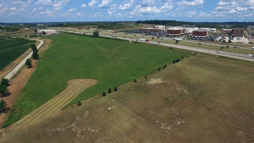 The city of Miamisburg is looking to contract with the Montgomery County Transportation Improvement District to oversee the $4.7 million Byers Connector Road construction project that leads to a new facility United Grinding North America is building near Interstate 75. STAFF/SKY 7