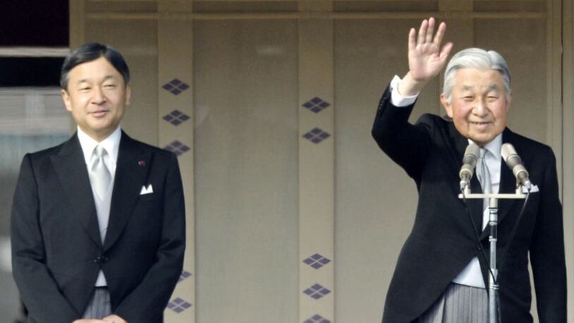 Japanese Emperor Akihito (right), alongside his elder son Crown Prince Naruhito, waved to the crowd on his 83rd birthday at the Imperial Palace in Tokyo in December.