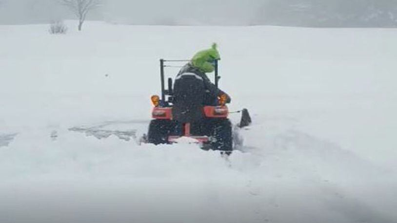 Someone in a Grinch mask plowed snow in North Carolina.