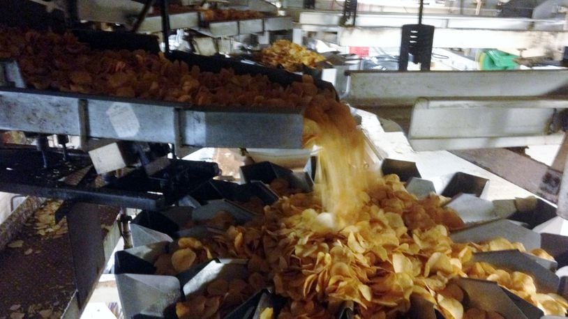 Chips being bagged at Mike-Sells Potato Chips Company on Leo Street in Dayton. (Photo by Amelia Robinson, Staff)