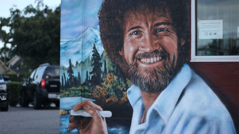 Muralist Jonas Never painted a mural of Central Florida native Bob Ross on the side of the Floyd's 99 Barbershop on Fairbanks Avenue in Winter Park this March. (Photo: WFTV.com)