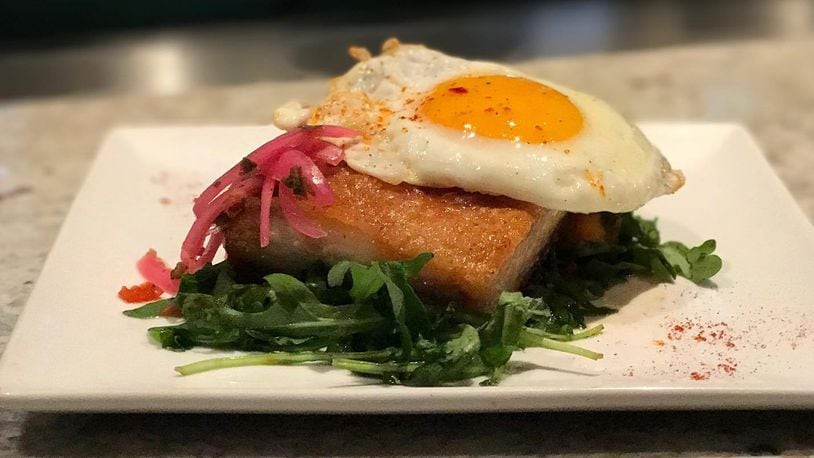 The pork belly at Salar is a crowd favorite. Photo: Salar