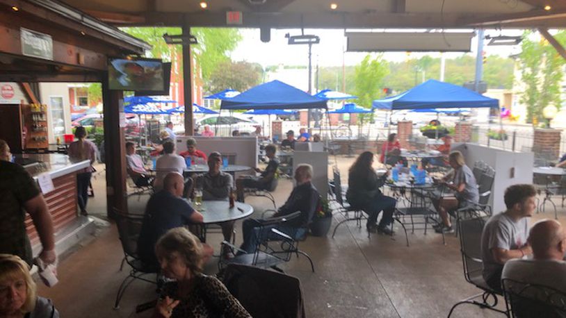 TJ Chumps’ Miamisburg restaurant reopened its patio on Friday, May 15, and the reopening received an enthusiastic response from diners at lunchtime. MARK FISHER/STAFF