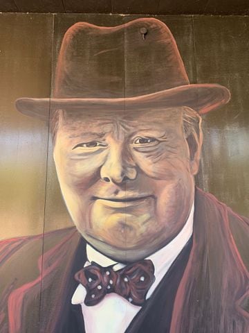 PHOTOS: Historic figure is the inspiration for uplifting downtown Dayton mural