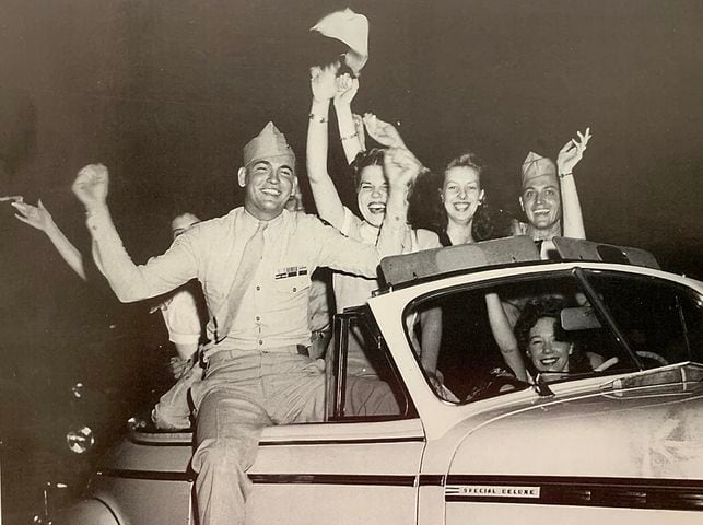 PHOTOS: Joyful crowds fill downtown Dayton celebrating the end of World War II