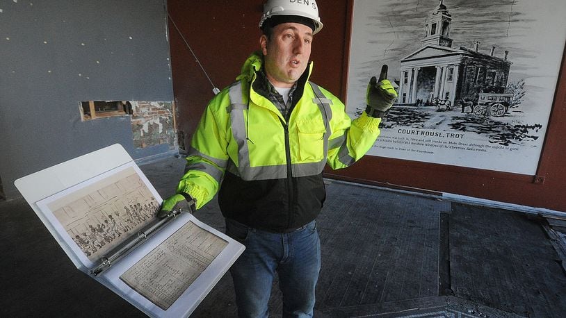 Ben Sutherly gives a tour Wednesday, Feb. 14, 2024 inside the controversial Troy Tavern building, which the Troy Historic Preservation Alliance is trying to save. MARSHALL GORBY\STAFF