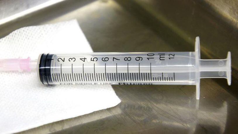 File photo of a syringe.