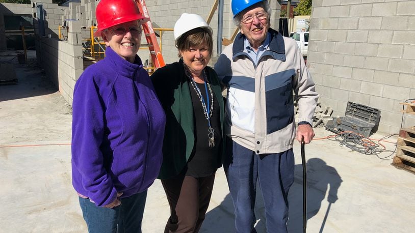 Elaine and Joe Bettman  are pictured  with the House of Bread’s executive director Melodie Bennett (center) in the Fall of 2018 during the construction of  the facility’s expanded family dining space. Joe Bettman, co-founder of the organization,  passed away Dec. 17.