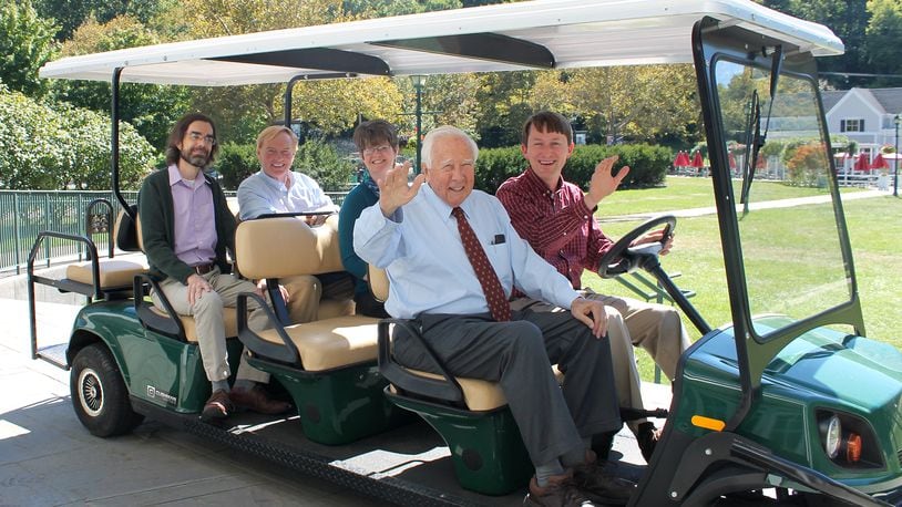 Alex Heckman, vice-president of Dayton History, at the wheel of golf cart with the Pulitzer Prize winning author David McCullough. CONTRIBUTED PHOTO
