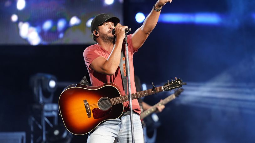Luke Bryan performs on the Proud To Be Right Here 2021 tour at the Hollywood Casino Amphitheatre on Saturday, Aug. 21, 2021, in Tinley Park, Ill. (Photo by Rob Grabowski/Invision/AP)
