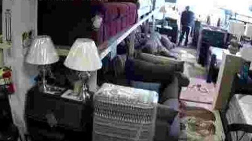 Video shows a man attempting to rob an Indianapolis furniture store.