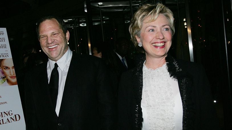 Producer Harvey Weinstein and Senator Hillary Clinton (D-NY) attend the "Finding Neverland" premiere at the Brooklyn Museum October 25, 2004 in New York City. (Photo by Evan Agostini/Getty Images)