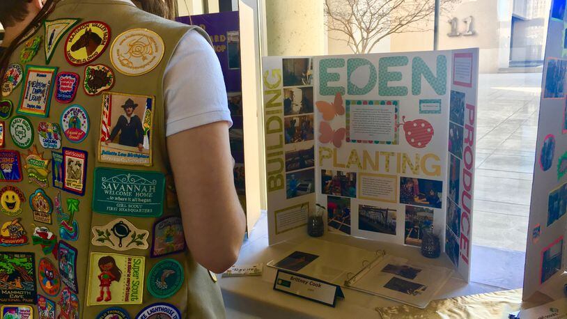 Local Girl Scouts look over the projects that won Gold Awards this year, the top honor for high school Girl Scouts. 21 Dayton-area Girl Scouts received the award this year and were honored at a ceremony at Sinclair Community College Sunday, March 4, 2018.