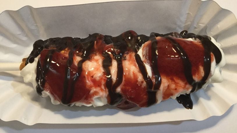 Fudge Puppies are the new treat on the block at the Troy Strawberry Festival. These Belgium waffles on a stick are dipped in fudge and then topped to your liking with toppings including strawberries, whipped cream, caramel, chocolate, peanut butter, sprinkles and more. CONTRIBUTED