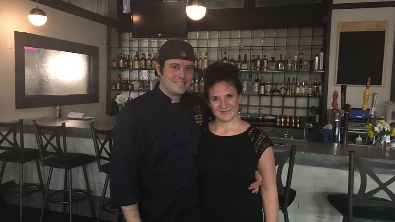 Jack and Natalie Skilliter pictured in front of the bar at their Oregon District restaurant, Corner Kitchen. CONTRIBUTED