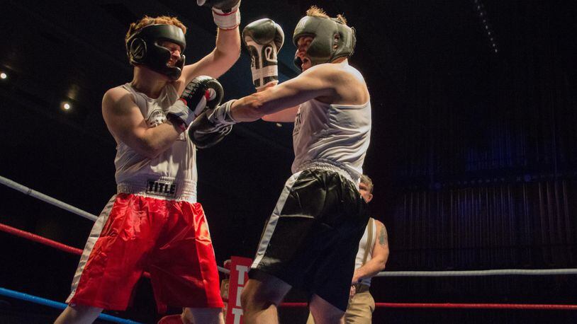 Hundreds of spectators packed Dayton Memorial Hall to watch 12 fighters from across the Miami Valley test their skills in the ring during Dayton History Fight Night, a 1920s-style boxing exhibition event. (TOM GILLIAM/CONTRIBUTED)