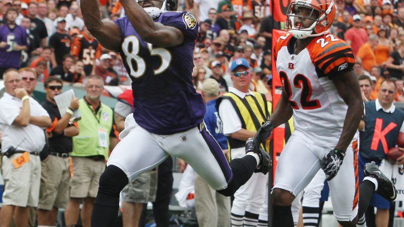 Derrick Mason, a Baltimore receiver, scores a touchdown against the Bengals in this September 2010 game. FILE
