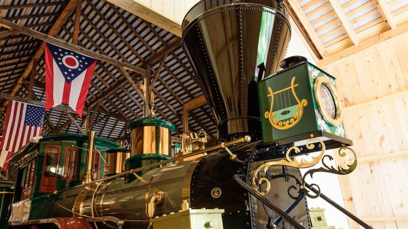 The new passenger train at Carillon Historical Park is a full-size replica of the “Cincinnati,” the first locomotive to pull a passenger train into Dayton in 1851 on the Cincinnati, Hamilton & Dayton Railroad. TOM GILLIAM / CONTRIBUTING PHOTOGRAPHER