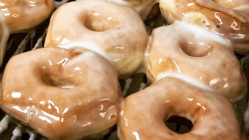 Glazed doughnuts from Bear Creek Donuts in Miamisburg. The shop and its sister doughnut shop, Donut Haus in Springboro, will reopen with limited hours and social-distancing restrictions during the coronavirus pandemic.