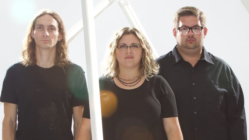 Cincinnati-based instrumental post-rock group Us, Today, (left to right) Joel Griggs, Kristin Agee and Jeff Mellott, perform at the Trolley Stop in Dayton on Saturday, Oct. 26. CONTRIBUTED