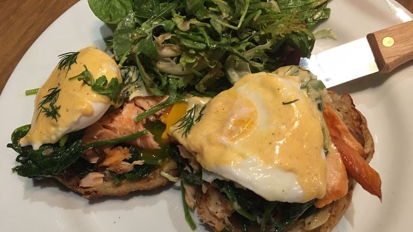 Wheat Penny's house-smoked Salmon Benedict is a must-try. A homemade dense but fluffy English muffin is topped with a generous amount of flavorful, tender in-house smoked salmon and topped with perfectly poached eggs and smoked tomato Hollandaise sauce. ALEXIS LARSEN/CONTRIBUTED