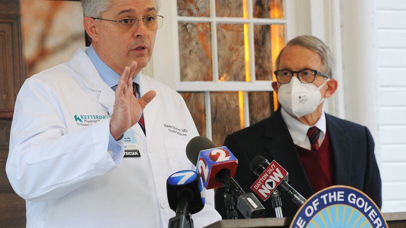 Kevin Sharrett, MD, Spoke during a press conference at Governor Mike DeWine home Wednesday morning about the dangers of coronavirus. MARSHALL GORBY\STAFF
