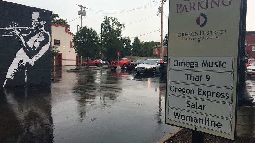 An Oregon District parking lot will begin charging customers for parking for certain times of the day. STAFF/CORNELIUS FROLIK