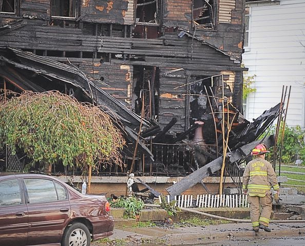 PHOTOS: Fire destroys Dayton home